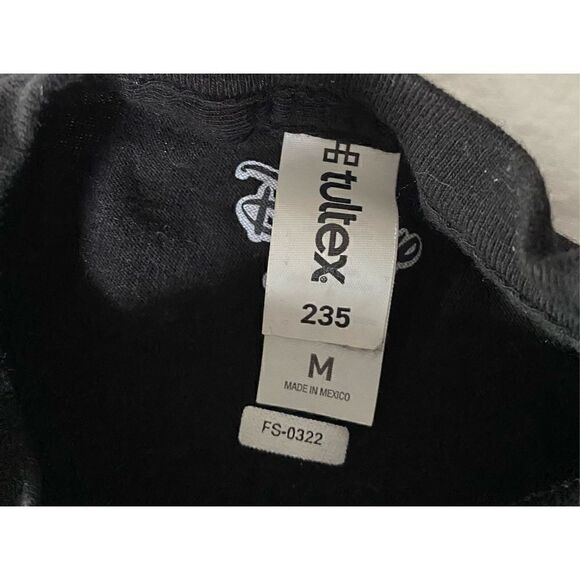 Kid’s Disney Encanto “ We Don’t Talk…” black short-sleeve T-shirt - Picture 5 of 5